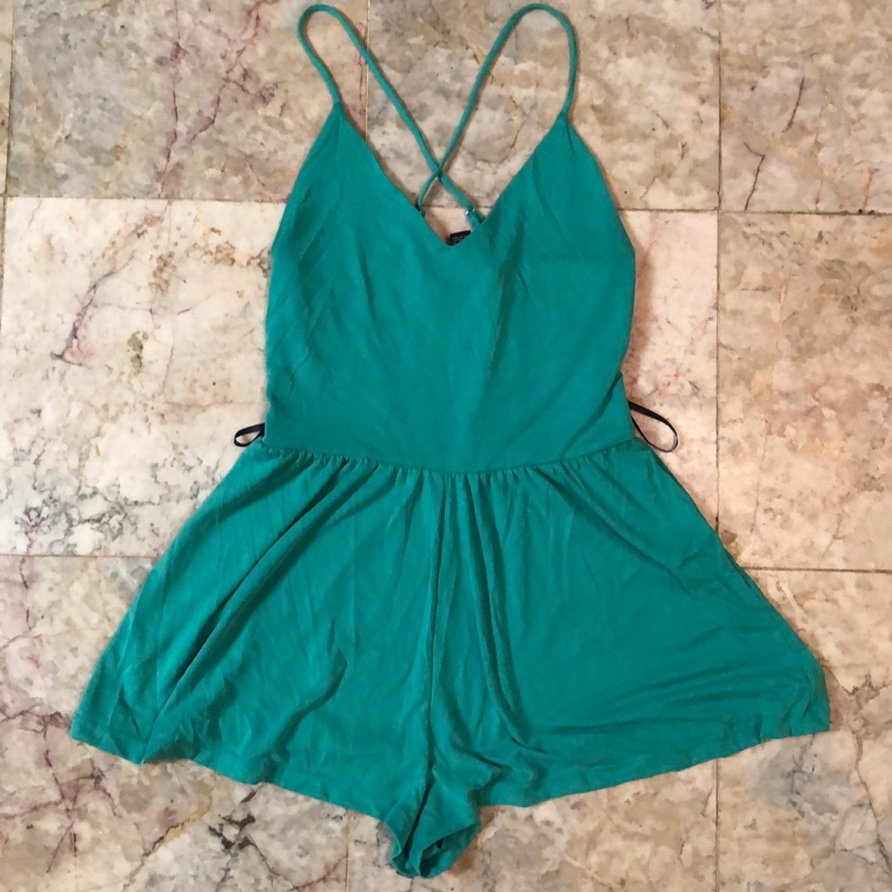 Green jumpsuit with straps